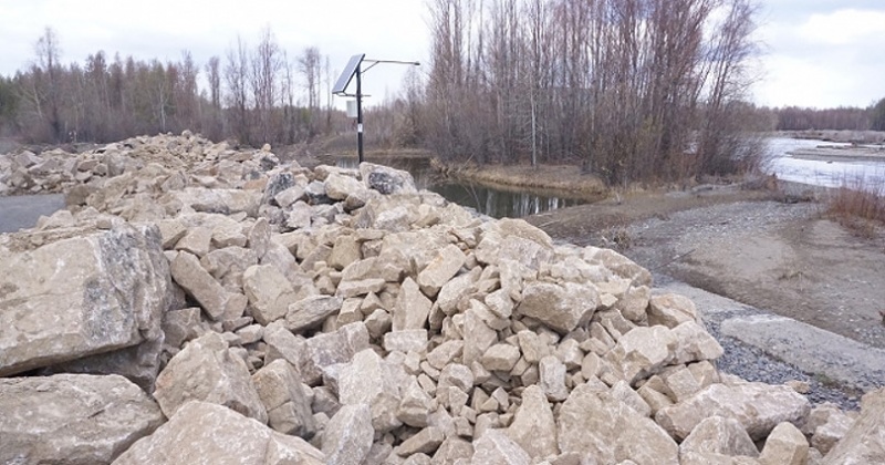Укрепление дамбы на реке Сеймчан полностью завершат в следующем году